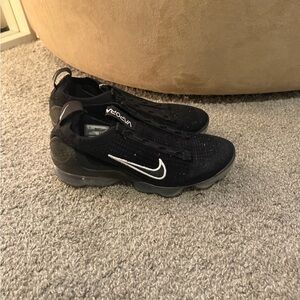 Nike Black Sneakers with White Swoosh